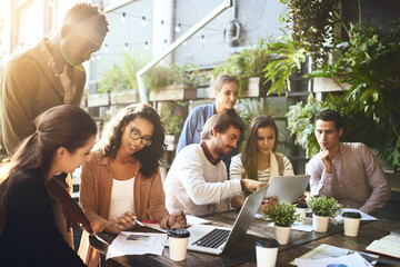 Poster - Where productivity flourishes. a group of colleagues having a meeting at a cafe.
