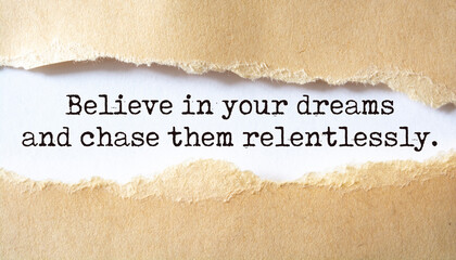 Inspirational motivational quote. Believe in your dreams and chase them relentlessly.