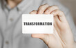 © Studio Nova - Card with text Transformation in a man's hand