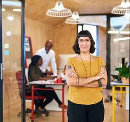 Aufkleber - Im taking the lead. a creative businesswoman standing in her office with colleagues blurred in the background.