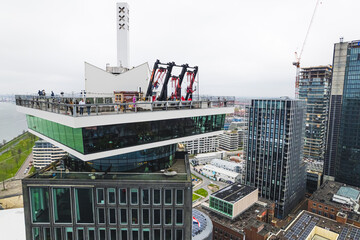 birdseye view of swings on the roof of the skyscraper Lookout in Amsterdam, Netherlands. High quality photo