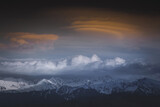 Fototapeta Góry - Tatra mountains covered with snow at sunset