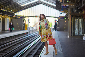 Poster - Young woman in Parisian underground