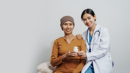 Elderly Asian female patients with cancer specialists meet by appointment to receive treatment advice for breast, cervical, lung cancer.