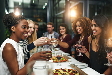 Food, party and wine with friends at restaurant for celebration, pizza and social event. Happy, diversity and toast with group of people eating together for fine dining, cheers and free time