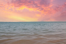 Water Surface, Sky And Horizon Line At Sunset. With Copy Space.