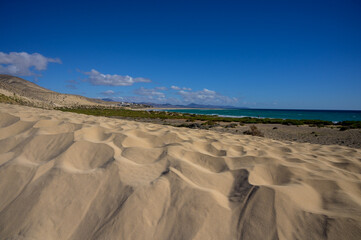  Sandy dunes and turquoise water of Sotavento beach, Costa Calma, Fuerteventura, Canary islands, Spain