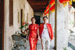 © topntp - Happy young Asian couple in Chinese traditional dresses