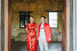 © topntp - Happy young Asian couple in Chinese traditional dresses
