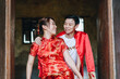 © topntp - Happy young Asian couple in Chinese traditional dresses
