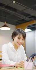 Wall Mural - asian happy businesswoman working