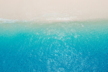 Wall Mural - Tropical beach and crystal blue ocean. Aerial view of holidays beach in Maldives