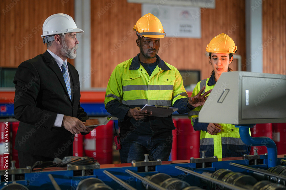 Senior boss manager talking staff engineer assistant woman and African ...