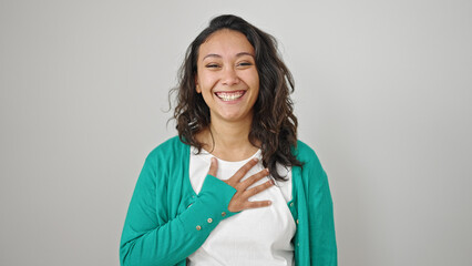 Poster - Young beautiful hispanic woman smiling confident touching chest over isolated white background