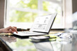 © Andrey Popov - Accountant Calculating Electronic Invoice Or E Bill