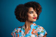 © All Creative Lines - A portrait of a young african american woman with an afro hair style against a blue background. Generative AI