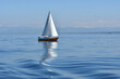Segelboot mit Spiegelung auf dem Bodensee