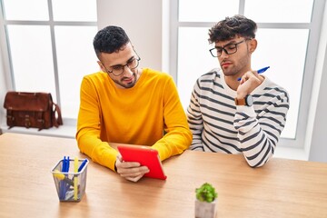 Canvas Print - Two man business workers using touchpad working at office