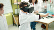 © Krakenimages.com - Adorable boys scientist student using virtual reality glasses at laboratory classroom