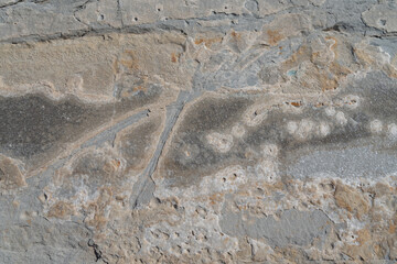 Wall Mural - natural rough weathered rock texture abstract background beige gray