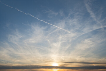 Wall Mural - Majestic sunrise dramatic skyscape. Amazing clouds with orange blue light