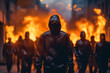 © wetzkaz - a fire burns in a big city surrounded by hooded males, men as aggressors or looters or violent rioters . Generative AI