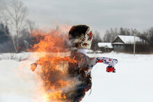 Straw Effigy Burn In Winter In The Village For A Holiday