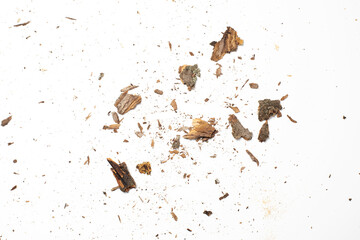 crushed tree bark remains macro shot, small wood pieces splints isolated on white background