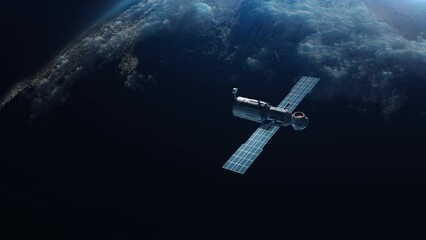 Wall Mural - artificial earth satellite orbiting the planet flies away in the space of space. concept video techn