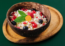 Coconut Bowl With Cottage Cheese And Ripe Berries