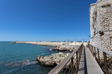 Wall Mural - View of the pier of the fishing village of Giovinazzo, province of Bari, Puglia, Italy