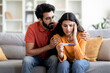 © Prostock-studio - Infertility Problems. Portrait Of Upset Indian Couple Looking At Negative Pregnancy Test