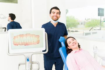 Wall Mural - Portrait of a dentist and patient designing her new smile