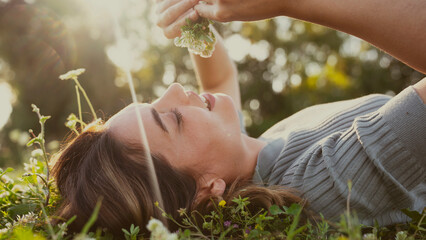 Relaxed woman resting on the grass