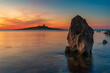 Sun setting behind the islet of Isola delle Femmine, province of Palermo IT