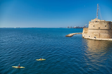 Canvas Print - View at the Bastion and Wall of Aragon Catle at coast of Ionian Sea in Taranto