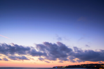 Wall Mural - clouds on the sky at twilight. beautiful nature background in colorful light at dawn