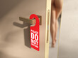 © simone_n - Red label 'do not disturb'. Silhouette of a naked woman on a blur background