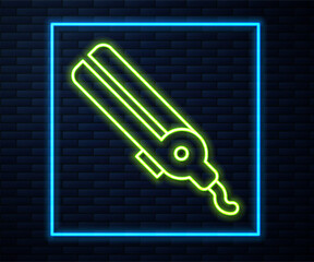 Poster - Glowing neon line Curling iron for hair icon isolated on brick wall background. Hair straightener icon. Vector