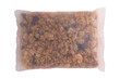 granola with fruits and nuts in transparent plastic bag isolated on white background, baked muesli mix, breakfast cereals