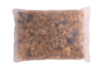 Sticker - granola with fruits and nuts in transparent plastic bag isolated on white background, baked muesli mix, breakfast cereals