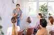 © JackF - Young experienced lecturer speaks to small female audience of listeners and talks about complementary application of theory and practice in modern medicine.