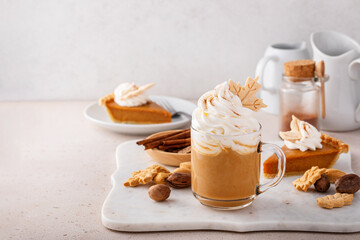 Wall Mural - Pumpkin pie latte with whipped cream and cinnamon