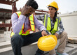 © chachamp - India engineer woman give encouragement to stress India engineer man at precast site work