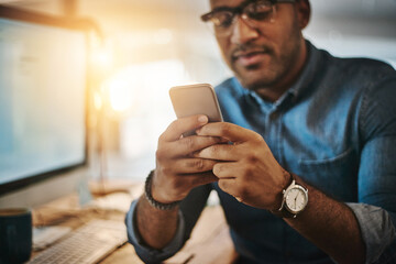 Fototapete - Night, business and man with a smartphone, typing and connection for social media, network or communication. Male person, employee or consultant with a cellphone, evening or texting to search website