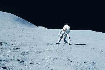 Wall Mural - an astronaut explores the moon. elements of this image furnishing nasa.