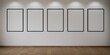 5 cadres vides accrochés sur un mur blanc avec des spots, illustration pour intégration, rendu 3d
