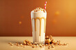 Frappe drink with caramel an nuts on golden background. AI generative.