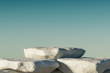 3d presentation pedestal made of stone over blue sky, outdoor scene. 3d rendering of mockup of presentation podium for display or advertising purposes. 3D Illustration