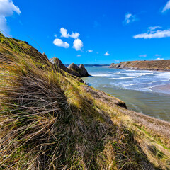 Poster - Three Cliffs Bay, a popular tourist destination located on the south coast of the Gower Peninsula in Wales.